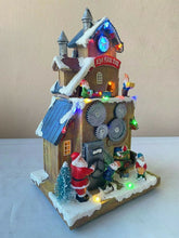 Cargar imagen en el visor de la galería, ESCENA FABRICA SANTA CON MUSICA LUZ LED MOVIMIENTO 13.5x16.5x29 cm