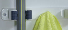 Cargar imagen en el visor de la galería, Colgador triple para escobas 3.2 x 35.5 cm blanco y gris con tornillos