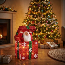 Cargar imagen en el visor de la galería, Papá Noel Saliendo de Caja Decorativo con Luz, Movimiento y Múltiples Melodías Navideñas - 26x26x32 cm, Diseños en Oro (Lazo Rojo) y Rojo (Lazo Verde o Dorado al Azar), Interruptor de Botón y Pilas AA No Incluidas
