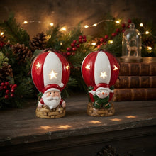 Cargar imagen en el visor de la galería, Set de 2 Globos Aerostáticos de Cerámica Navideños con Luz LED (Papá Noel y Muñeco de Nieve) 7.5x7.5x12 cm - Adorno de Navidad
