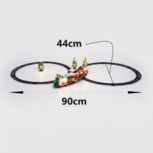 Cargar imagen en el visor de la galería, Tren Navideño de 22 Piezas con Luz, Sonido y Movimiento – Circuito 90x44 cm, Funciona con Pilas, Decoración Festiva Ideal para el Hogar
