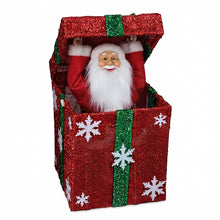 Cargar imagen en el visor de la galería, Papá Noel Saliendo de Caja Decorativo con Luz, Movimiento y Múltiples Melodías Navideñas - 26x26x32 cm, Diseños en Oro (Lazo Rojo) y Rojo (Lazo Verde o Dorado al Azar), Interruptor de Botón y Pilas AA No Incluidas
