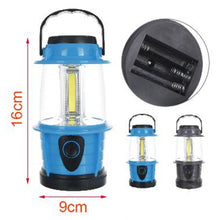 Cargar imagen en el visor de la galería, Lámpara de Camping LED 6W Portátil – Funciona con 3 Pilas AA, Linterna para Acampar, Pesca, Senderismo y Emergencias – 16 cm – Color Aleatorio
