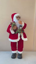 Cargar y reproducir el video en el visor de la galería, Figura Papá Noel de Pie con Luz, Música y Movimiento 87 cm Sensor de Voz Vestido Rojo y Lámpara Navideña
