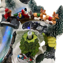 Cargar imagen en el visor de la galería, Poblado Navideño Escena Con Luz Led Música y Movimiento 19x18x31 cm Navidad
